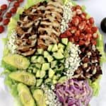 Honey Mustard Chicken Salad on oval platter with fresh veggies in back