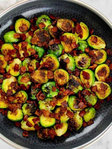 Sautéed Brussels Sprouts with Bacon in skillet